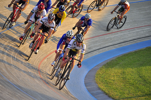 Bicycle riders in a velodrome